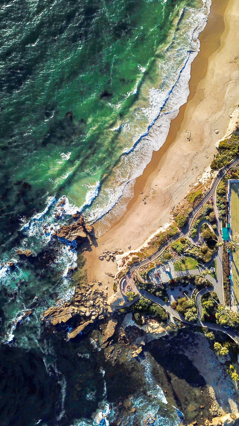 水沙自然户外海滩无人驾驶飞机空中海洋座位海岸波浪破碎从上往下树叶岩石道路橙县锍泉