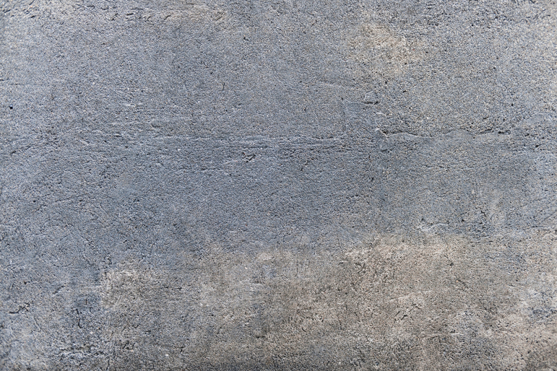 混凝土表面纹理石头灰色特写风化壁纸墙壁粗犷背景