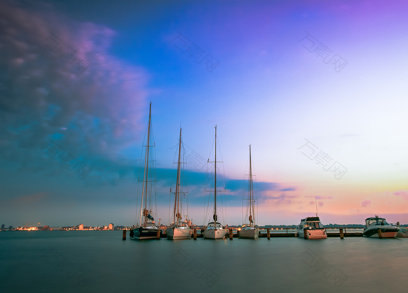 水域天空日落海旅行黄昏反射黎明端口码头的传输系统帆船晚上