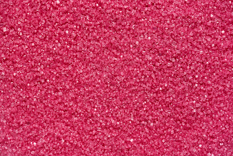 谷物糖纹理糖粒糖结晶粉红背景图案糖果甜软食物烘焙麦哲伦肉桂卡洛里红