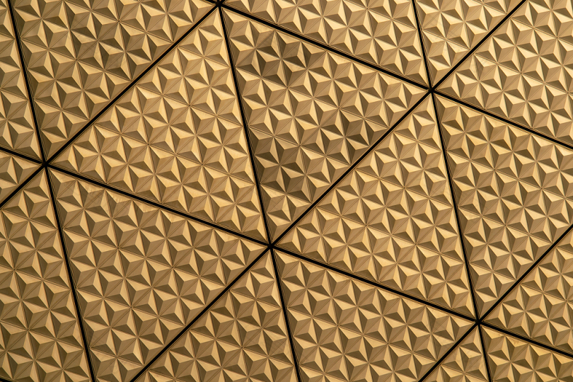 建筑墙壁几何图案纹理设计三角形镶嵌网格黄金大视野东京特写